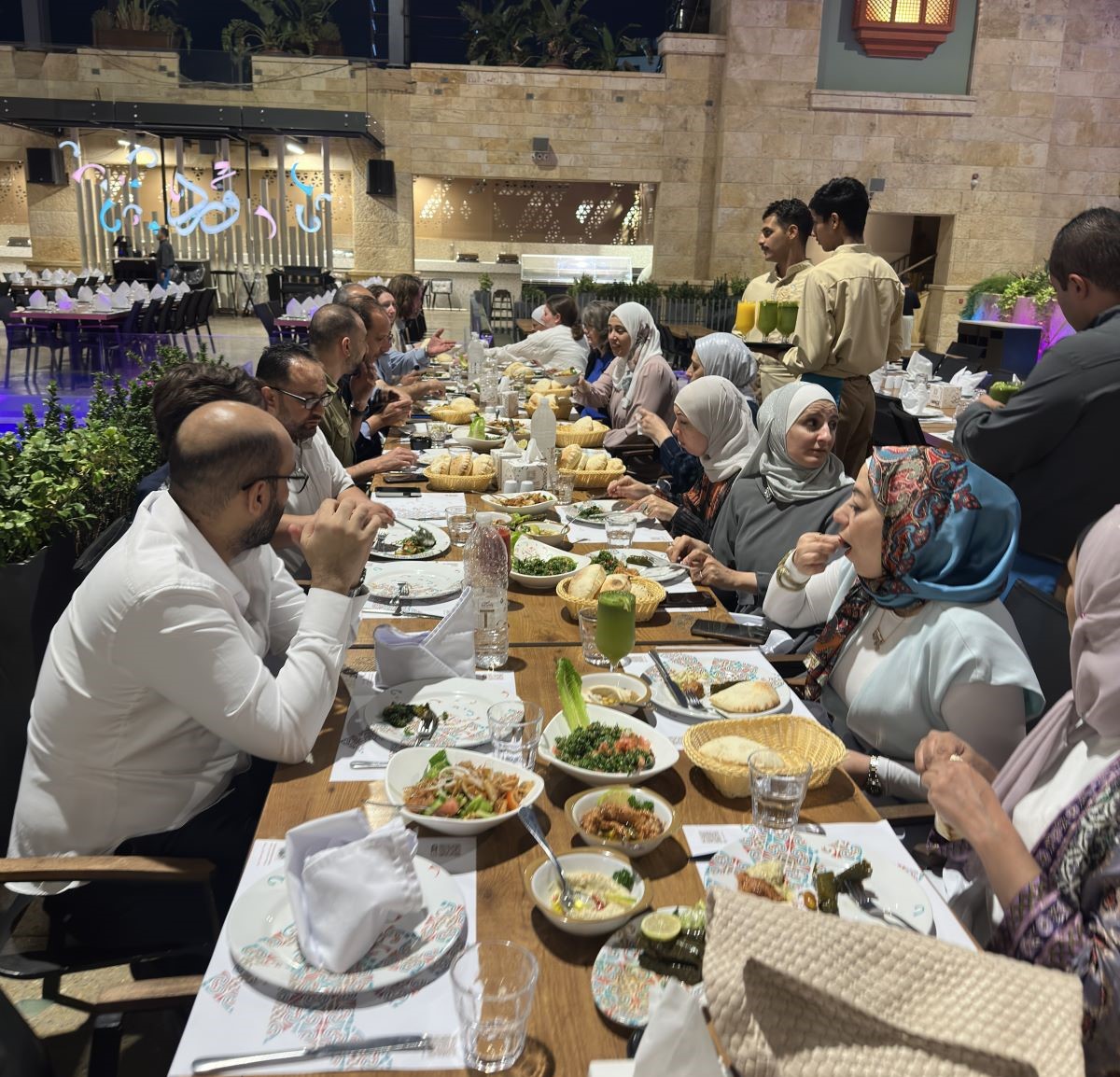 Minnesota Public Health Laboratory employees and Jordanian colleagues at dinner