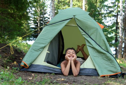 child in tent