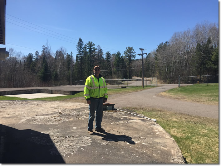 Tim Johnson by the building with the high-service pumps at the Spring Lake Reservoir. 