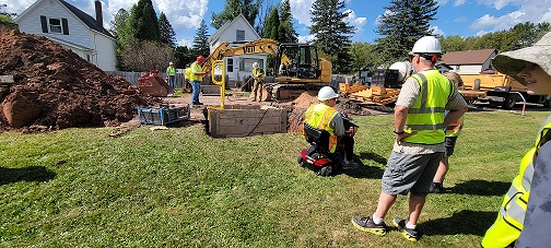 Minnesota Department of Health employees observe replacement of lead service lines in Duluth