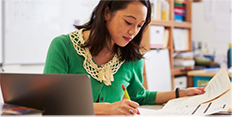 Teacher at desk