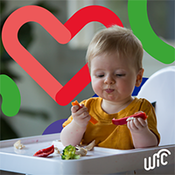 toddler eating veggies